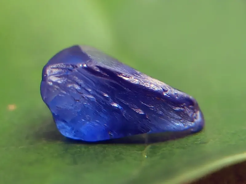 Close-up of a polished blue Ceylon sapphire gemstone