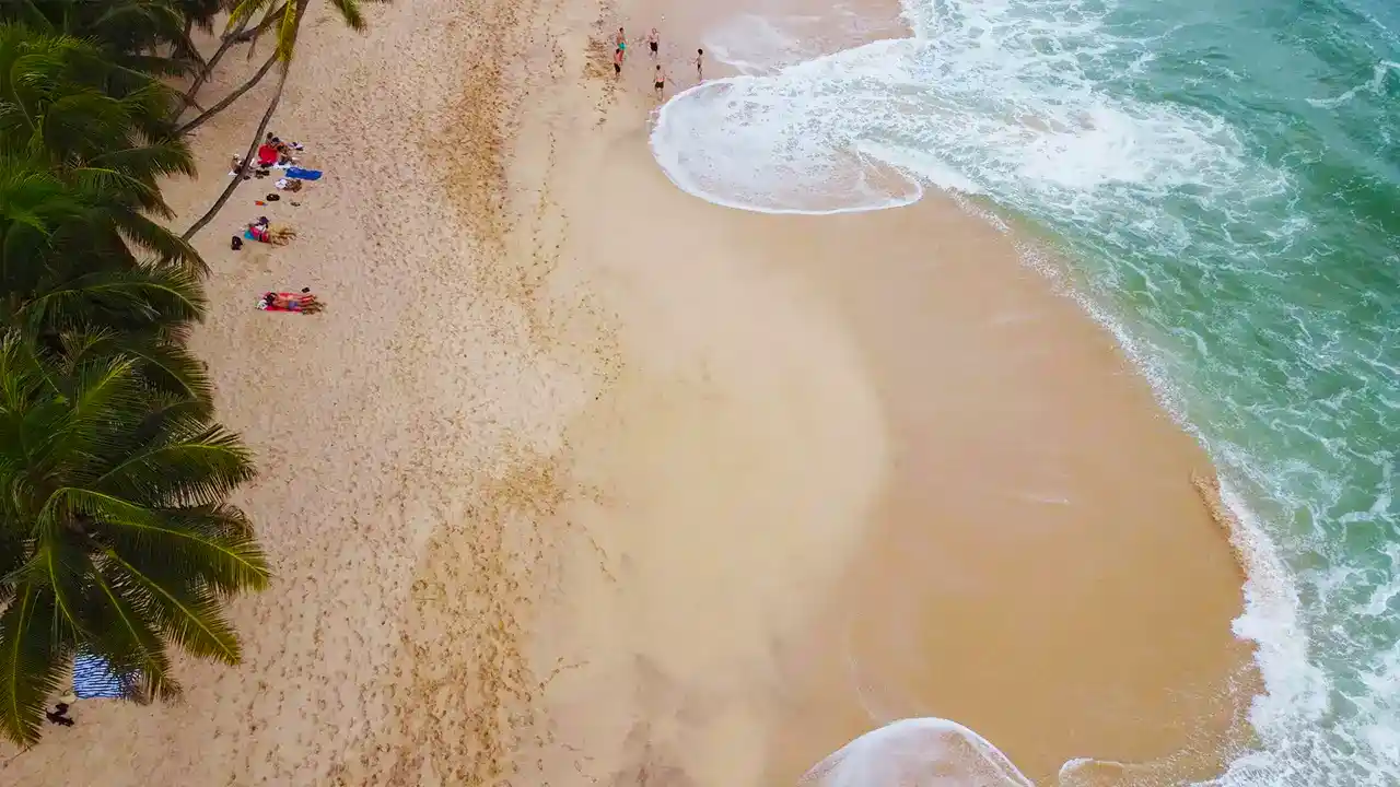 Dikwella Beach near Hiriketiya with golden sand and tropical coastline, Sri Lanka