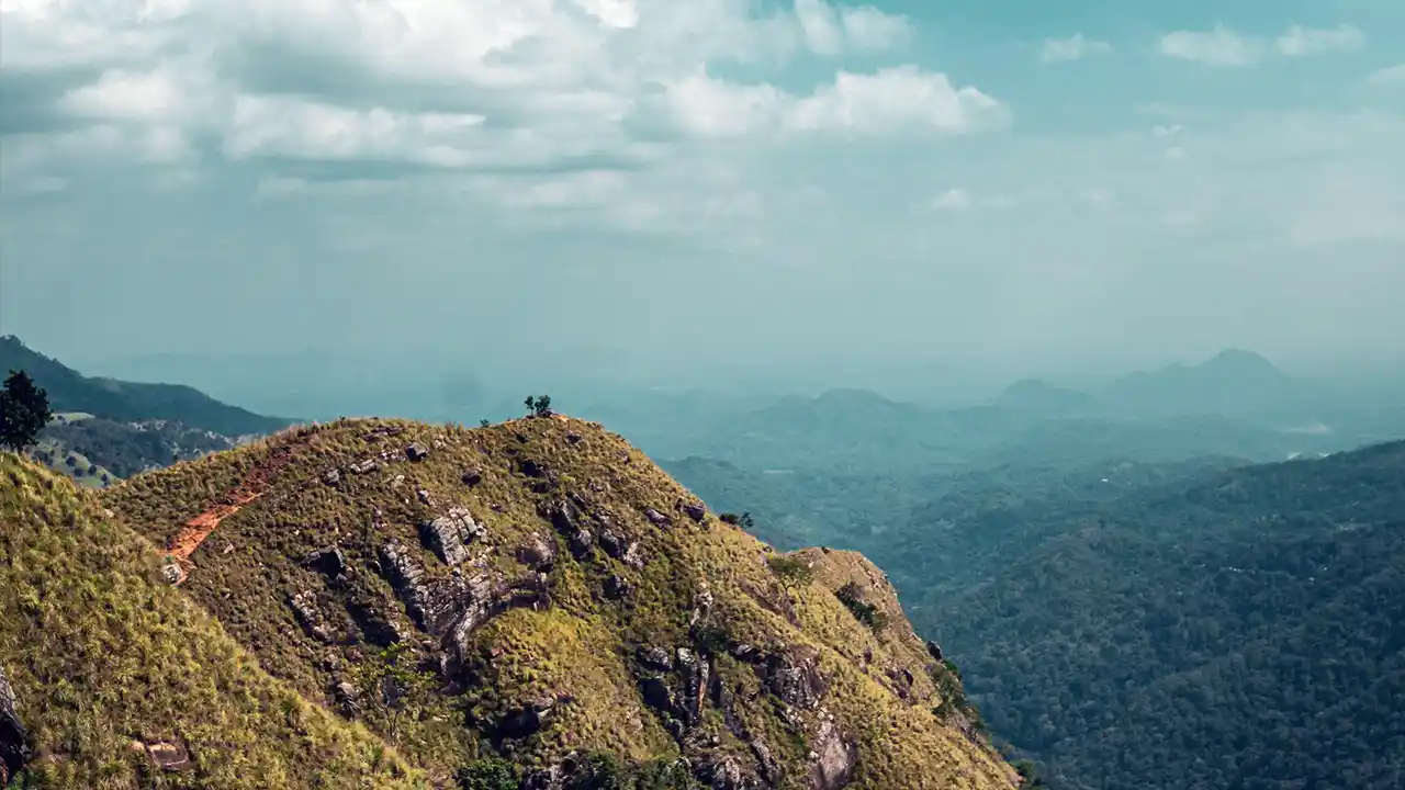 Ella Rock and Little Adam’s Peak overlooking the lush hills of Ella.