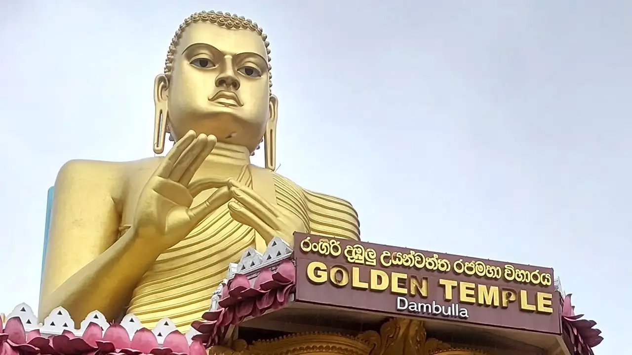 Dambulla Golden Cave Temple showcasing ancient Buddhist statues and murals in Sri Lanka.