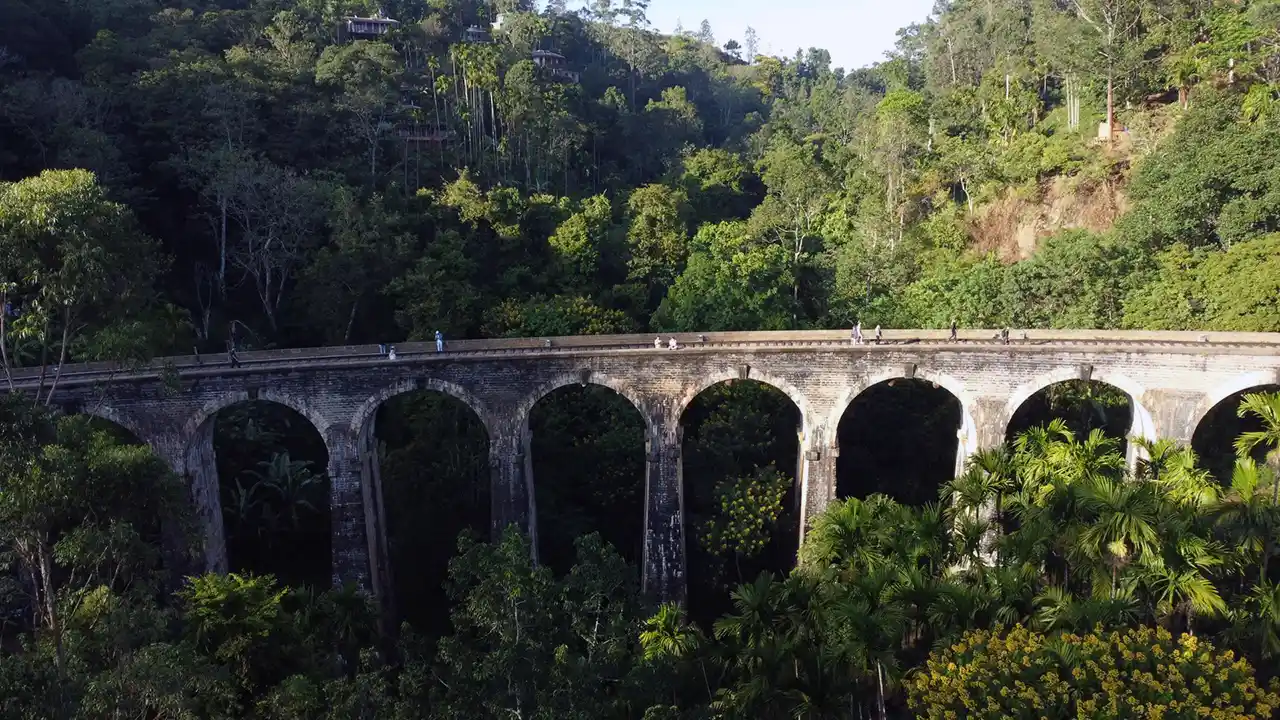 Nine Arch Bridge in Ella surrounded by lush tea plantations and jungle – Sri Lanka Travel Tours
