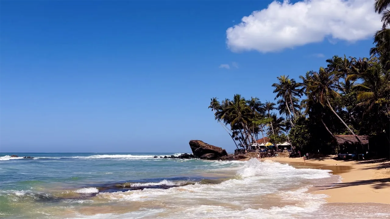 Unawatuna beach destination and tropical coastline in Sri Lanka