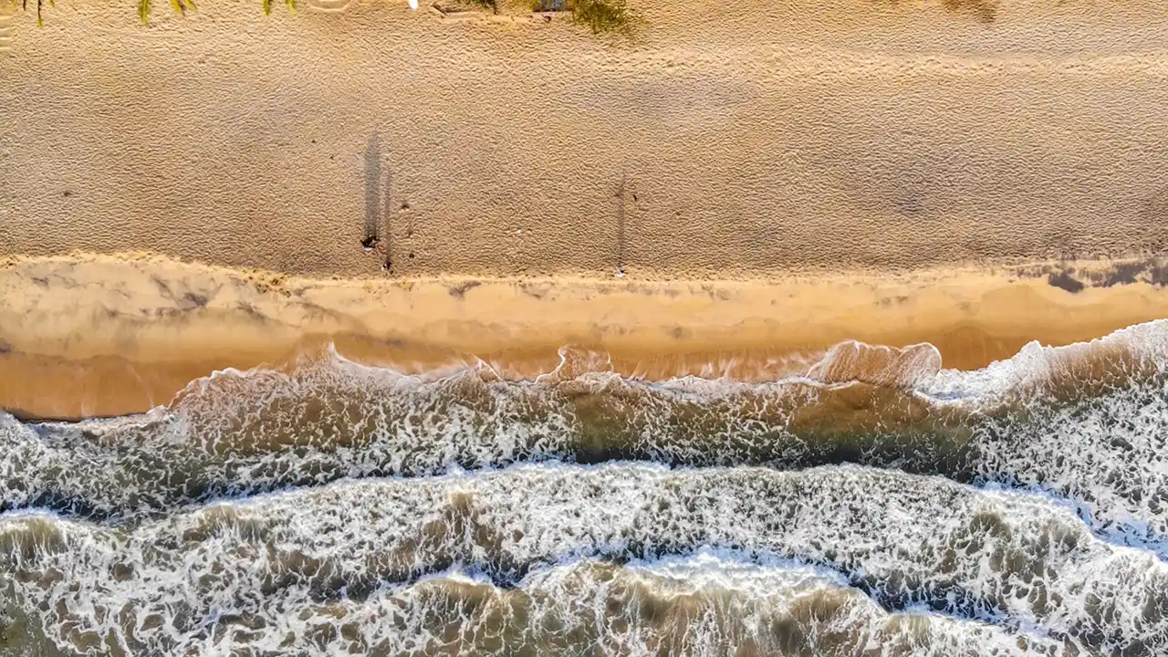 Surfers enjoying a session at Main Point, Arugam Bay, Sri Lanka