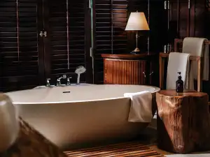 Infinity pool and private cabana at Cape Weligama with ocean views
