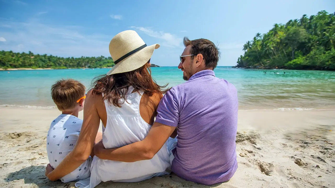 Family enjoying quality time together at a Sri Lankan beach