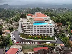 The Grand Kandyan Hotel luxury rooftop pool with panoramic views over Kandy, Sri Lanka